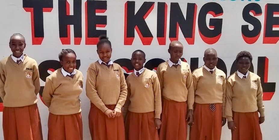 Seven of WSI's new female students at The King Secondary School